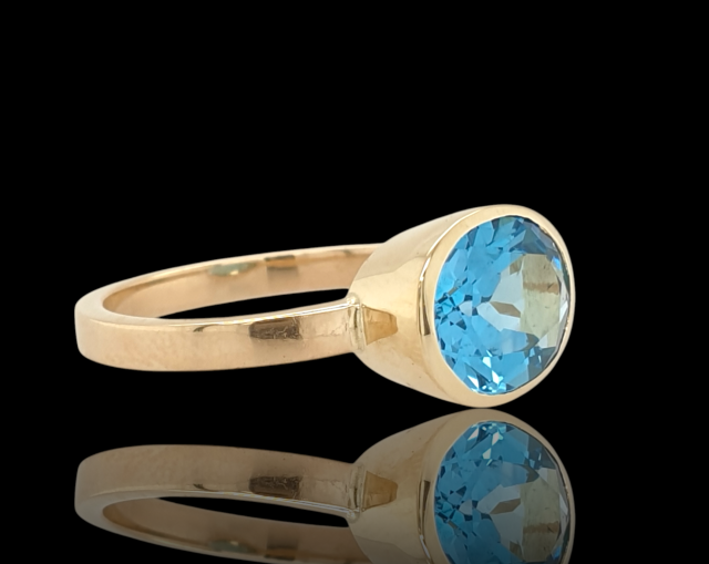 14 karaat gouden ring met Topaas Suisse Blue m#27341